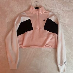 A pink,white, and black cropped hoodie!